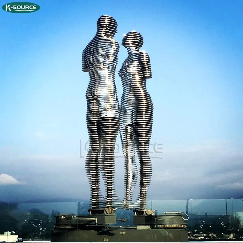 शहरी स्टेनलेस स्टील घूर्णन पावर मूर्तिकला सार युगल शरीर प्रतिमा मशीन विदेशी मूर्तिकला