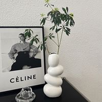 Vase en céramique créatif style INS, haut de gamme, en forme de galet, pour la décoration intérieure, arrangement floral pour salon, décoration de hall d'entrée