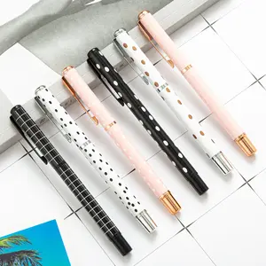Vente en ligne de stylo à pois en métal rayé créatif de mode de luxe avec logo personnalisé cadeau promotionnel stylo à gel à rouleau en métal
