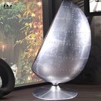 Fauteuil œuf vintage industriel en aluminium Spitfire, forme de pilote, fauteuil pod moderne en fibre de verre, tissu, cuir pour utilisation en extérieur, centre commercial