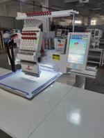 Machine à broder au laser informatisée multifonctionnelle à tête unique Yeshi pour broderie plate de t-shirt de casquette