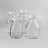 Bouteilles en verre carrées transparentes de 250 ml, 350 ml, 500 ml, 1000 ml, 8 oz avec bouchon à vis hermétique pour jus pressé à froid