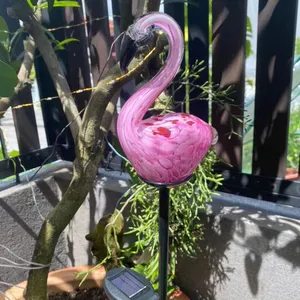 ขายส่งมือเป่าแก้วสีชมพูแบบกําหนดเอง Flamingo สวนพลังงานแสงอาทิตย์ไฟ Flamingo สีชมพู