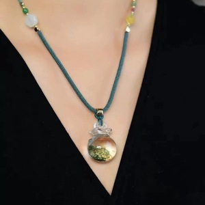 El colgante de cristal fantasma verde, con la apariencia de una bolsa de dinero, tiene el <span class=keywords><strong>significado</strong></span> de riqueza - Product Image 4