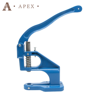 Machine à presser manuelle APEX pour œillets, boutons-pression métalliques, boutons de jeans, rivets et perforation de trous pour vêtements, vestes et autres articles.