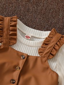 नई शैली लड़कियों लंबी आस्तीन तुले बुनाई टी-शर्ट + स्लीवलेस बनियान + pu चमड़े की स्कर्ट 3 टुकड़े कपड़े सेट - Product Image 3