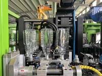 Machine de soufflage de bouteilles d'eau en PET entièrement automatique à 2 cavités, qualité commerciale, 500 ml et 1500 ml, vente en gros directe d'usine
