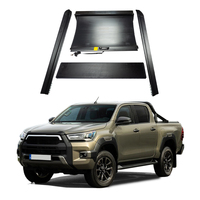 Accessoires de camionnette à volet roulant manuel d'usine couvertures de lit de camion rétractables couverture de tonneau pour hilux revo vigo
