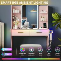 Bureau de maquillage rose intelligent avec éclairage LED RVB et station de charge intégrée, table à maquillage à 2 tiroirs avec support pour sèche-cheveux.