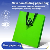 Sac en papier design personnalisé pour vêtement Emballage cadeau Sac à provisions en papier de luxe avec votre propre logo