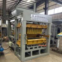 Machine entièrement automatique de fabrication de pavés et de bordures en béton 4-15