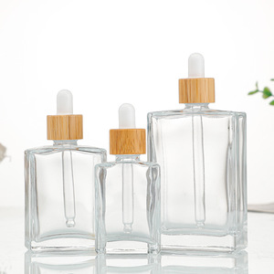 Bouteilles vides d'huile essentielle OEM contenant pour produits de soin de la peau <span class=keywords><strong>flacon</strong></span> compte-gouttes carré en verre transparent avec couvercle en bambou et pipette en caoutchouc - Product Image 2