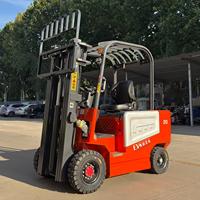 Chariot élévateur électrique 2T à transmission automatique avec pneus pleins, positionneur de fourches et levage de 3m pour usage en entrepôt