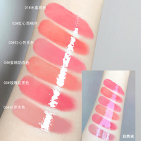 Cappuvini personnalisé Logo brillant à lèvres miroir en forme d'huile plus dodue fleur pétale disque conception avec boîte emballage brillant maquillage cosmétiques