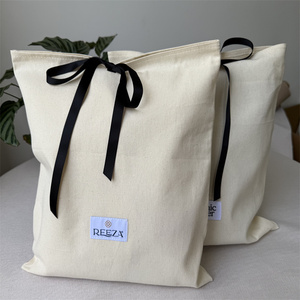 Factory Custom Logo Size Cotton Dust Bag Natural Cotton Clothes <b>Gift</b> Packing Bag with Woven Label and Ribbon - Product Image 1