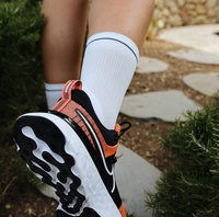 Chaussette athlétique professionnelle d'approvisionnement d'usine Chaussettes de sport en coton tricoté unisexe Chaussettes de sport avec logo personnalisé