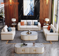Ensemble de meubles de salon en cuir avec canapé en métal doré, canapé moderne modulaire avec structure en bois et métal doré pour salon de villa