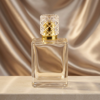 Flacon de parfum carré en verre sur mesure de haute qualité 100 ml avec pulvérisateur et emballage en gros
