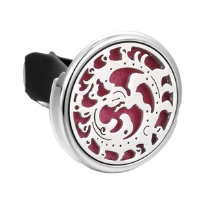 Clip diffuseur de parfum magnétique en acier inoxydable pour grille d'aération de voiture, style ouvert, avec médaillon flottant - Product Image 1