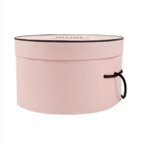 Boîte d'emballage de chapeau en carton ronde personnalisée avec poignée en corde, gaufrage, laminage mat et revêtement UV