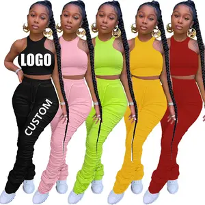 Conyson gran oferta moda verano logotipo personalizado hecho al aire libre señora color puro ropa traje al por mayor pantalones de 2 piezas conjunto de ropa de mujer