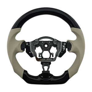 Productos Populares, Novedades, Cuero Perforado con Acabado Negro Piano para Volante de Coche Nissan - Product Image 1