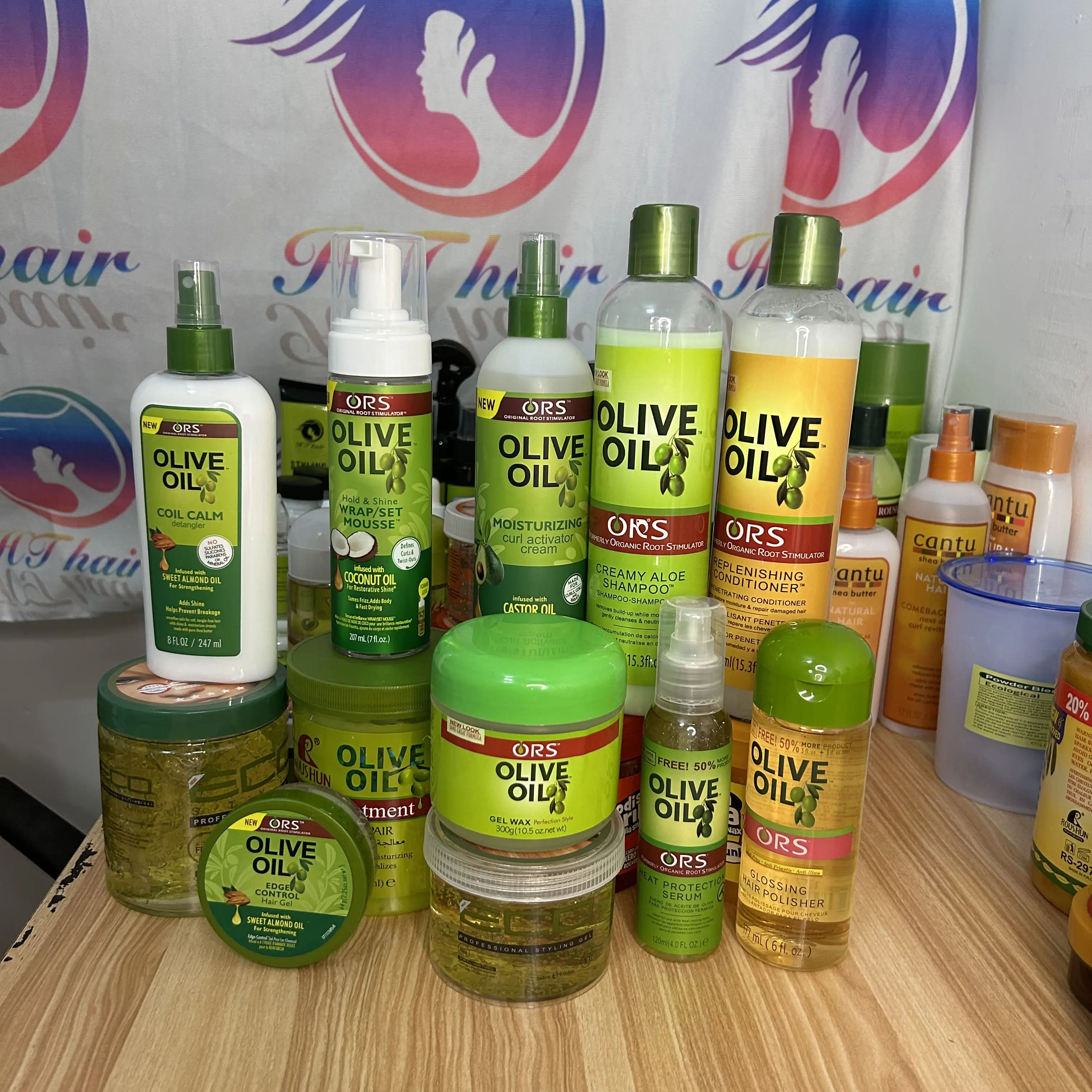 Fournisseur professionnel de produits capillaires démêlant ou shampooing et après-shampooing à l'huile d'olive vernis à cheveux en spray acticator bouclé