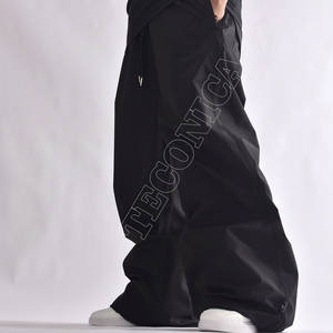 Pantalones de Nieve Negros Extra Holgados Estilo Urbano 2025, Impermeables, con Ventilación, Bolsillos con Cremallera, Cintura con Cordón y Puños Elásticos - Product Image 1