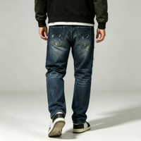 Jean slim droit bleu foncé pour homme, en denim déchiré et effiloché, cinq poches, style streetwear grunge, ourlet effiloché