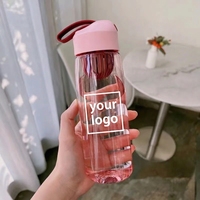 Bouteille d'eau haute capacité en PP pour extérieur avec infuseur à thé, sangle de transport et système anti-fuite pour usage général