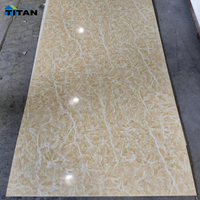 Panneau mural SPC personnalisé feuille de marbre UV brillant blanc neige type de marbre feuilles de PVC baguette Marmor plaque de panneau de PVC
