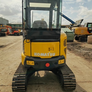 Mini-excavatrice sur chenilles Komatsu PC30 MR jaune, capacité de la benne de l'excavatrice Komatsu PC30 MR - Product Image 4