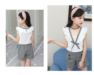 Nouveaux vêtements pour enfants en gros, mode indienne, ensemble haut sans manches en coton blanc avec nœud et short à carreaux pour fille - Product Image 2