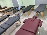 Cambodia hizo barato 3 secciones de aluminio moderno portátil Spa cama de tatuaje ajustable y mesa de masaje facial fácil de plegar