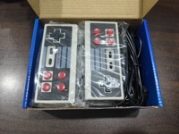 Console de jeu rétro avec 600 jeux intégrés, connexion filaire, prise EU/US, idéale pour les cadeaux d'anniversaire et les fêtes de famille