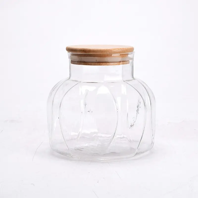 Handmade glass kitchen storage jar and wooden lids