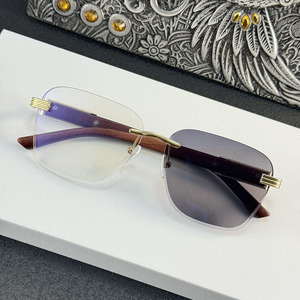 <span class=keywords><strong>Lunettes</strong></span> <span class=keywords><strong>de</strong></span> <span class=keywords><strong>soleil</strong></span> <span class=keywords><strong>photochromiques</strong></span> sans monture pour hommes et femmes avec verres gris-brun et branches dorées effet bois pour la protection solaire - Product Image 2