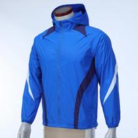 Veste coupe-vent unisexe imperméable en polyester durable avec capuche et blocs de couleur pour activités de plein air