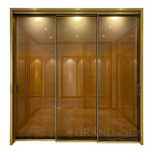 <span class=keywords><strong>Porte</strong></span> <span class=keywords><strong>coulissante</strong></span> moderne en verre et aluminium à trois rails automatiques dorée - Product Image 1
