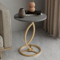 Table d'appoint ronde de luxe dorée pour salon, avec base en métal doré, style moderne