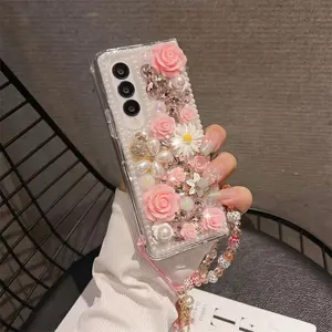 Couverture de téléphone de luxe fleur perle diamant pour Samsung Galaxy Z pli 5 4 3 couverture de strass Bling pour Z Flip 5 4 3 avec chaîne