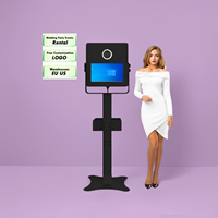 Miroir Photo Booth à Impression Instantanée 15,6 pouces avec Éclairage LED RGB, Mode Selfie SLR, Design Ovale, Écran Tactile, Métal, Wi-Fi, Garantie 2 Ans