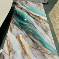 Film d'impression haute brillance à prix de gros, panneau mural en PVC, feuille de marbre, revêtement UV pour décoration intérieure, fond de télévision