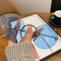 Lunettes de soleil rétro Protection UV Effet amincissant Monture large inspirée des célébrités d'Internet Modèle en alliage et pierre naturelle LXQ3529