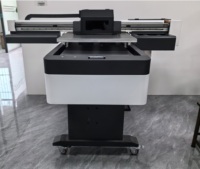 Meilleure vente 6090 machine d'impression UV imprimante à plat UV pour imprimer sur stylo bouteille étui de téléphone étiquette en cristal