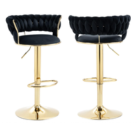Tabouret de bar moderne en velours noir tissé, pivotant et réglable, avec base et repose-pieds dorés, idéal pour cuisine, salon et usage commercial