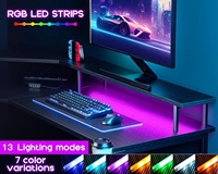 Échantillon gratuit DDP Drop 1 pièce Bureau de jeu noir en forme de L avec lumières LED Prises de courant Bureau d'angle avec porte-gobelet
