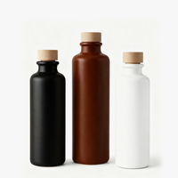 Bouteille d'huile d'olive en céramique noire et blanche de 200 ml en argile de poterie en gros avec logo personnalisé