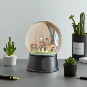 Customized 100mm Polyresin Snow Globe Model for Company Anniversary for Souvenir Use