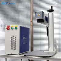 Machine de gravure laser à fibre de type split 30W pour la marquage de plaques signalétiques en acier inoxydable, de médailles pour chiens et d'accessoires métalliques